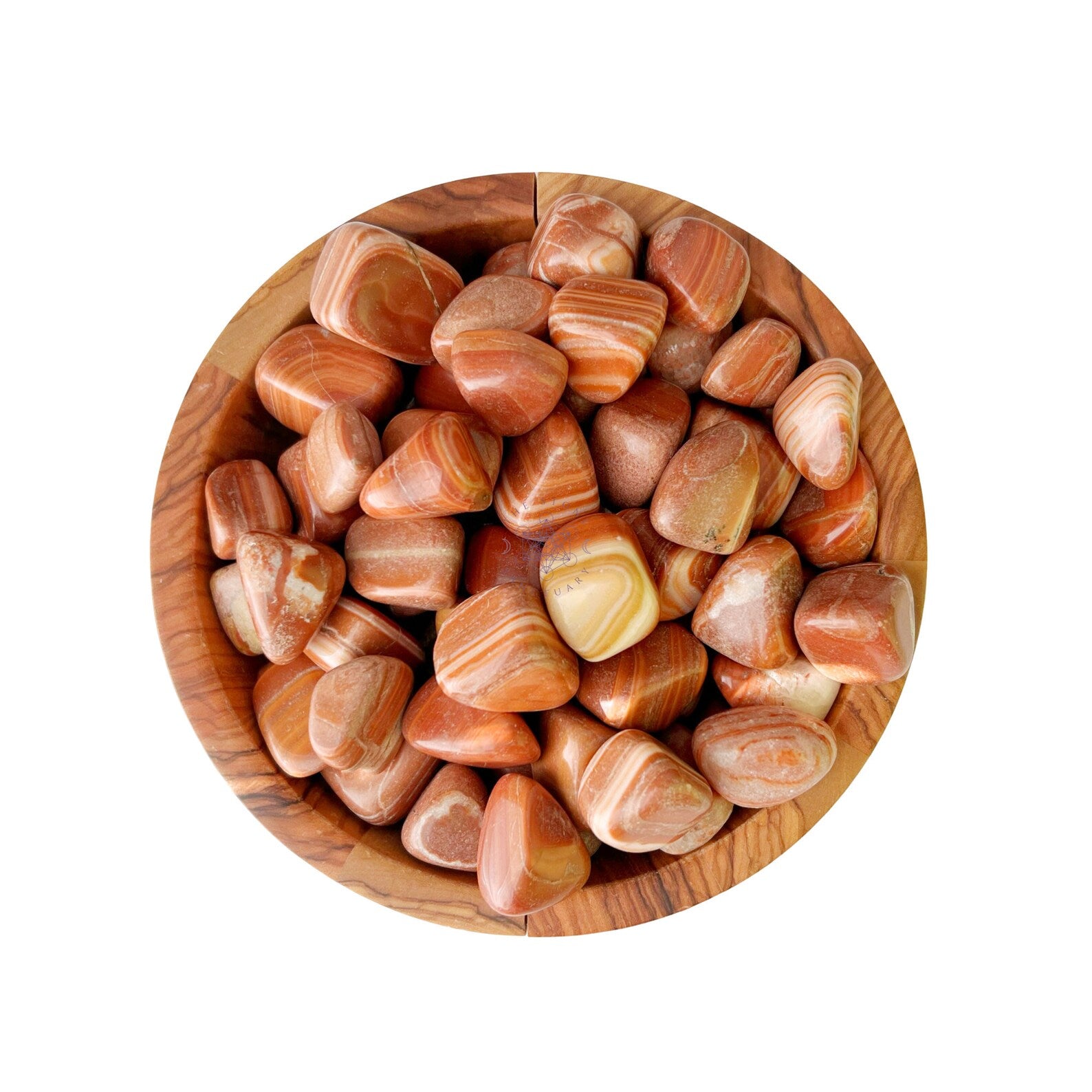 A wooden bowl filled with polished, smooth Red Malachite Tumbled Stones in various shades of orange and brown, showcasing natural striations and patterns, evokes a sense of the Root Chakra's grounding energy. The stones, similar in size with a shiny, glossy finish, rest elegantly on a white background.