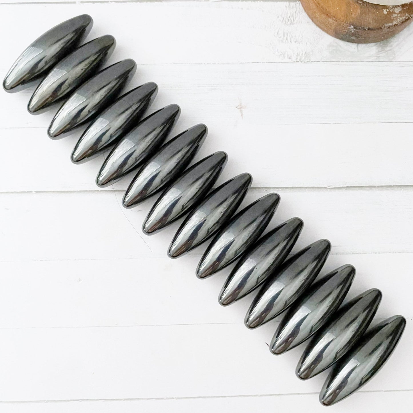 Hematite Rattlesnake Eggs - Elliptical Olive Zingers
